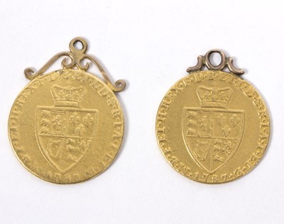 Lot 59 - Two George III gold spade guineas, 1787 and...
