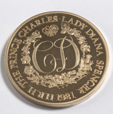Lot 62 - A 22ct gold coin commemorative of the marriage...