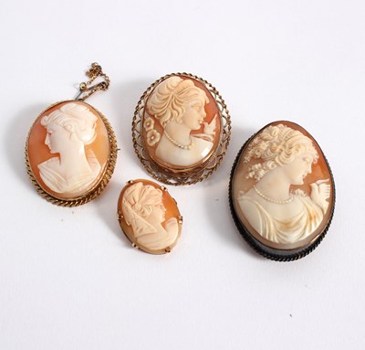 Lot 99 - A group of four cameo brooches, to include a...