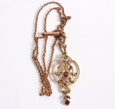 Lot 100 - An Edwardian 9ct gold pendant, the openwork...