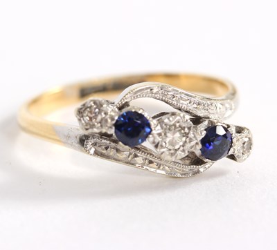 Lot 104 - A diamond and sapphire five-stone ring, with...