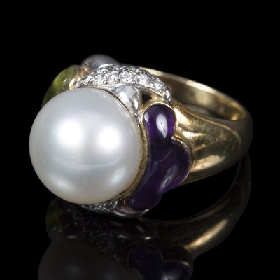 Lot 113 - A Garrard & Co. gem set dress ring, the...