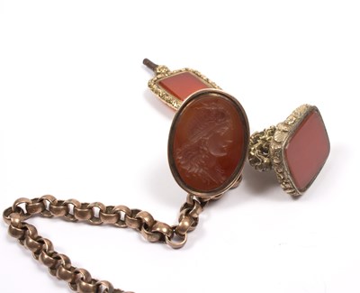 Lot 128 - A Georgian seal fob, the oval carnelian matrix...