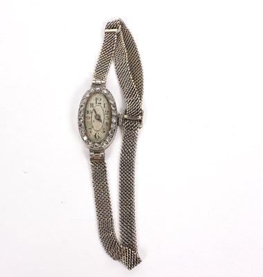 Lot 138 - An Art Deco ladies diamond set cocktail watch,...