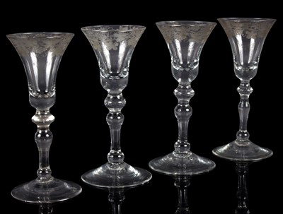 Lot 166 - Four English balustroid wine glasses, circa...