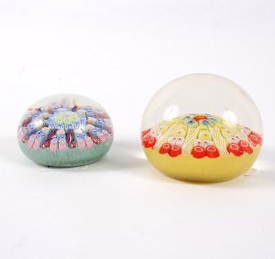 Lot 171 - Two glass paperweights, both with floral and...