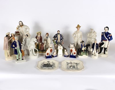 Lot 190 - A group of Staffordshire figures to include...