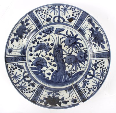 Lot 214 - An English blue and white delftware plate with...