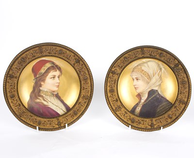 Lot 218 - A pair of German gilt-ground cabinet plates,...