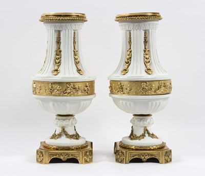 Lot 230 - A pair of mid-19th Century porcelain vases of...