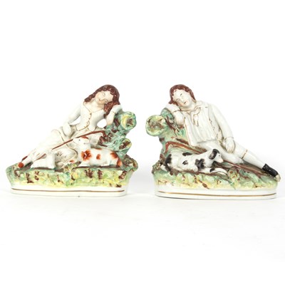 Lot 259 - A pair of Staffordshire figures of a shepherd...