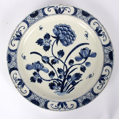 Lot 260 - A Dutch delft charger, 35.5cm diameter