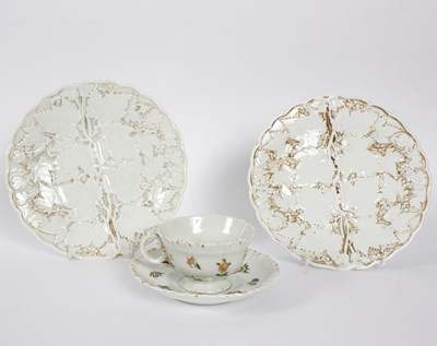 Lot 278 - Two Meissen moulded plates and a cup and...