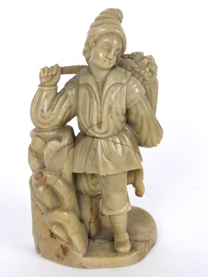 Lot 307 - A Chinese carved soapstone figure depicting a...