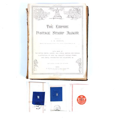 Lot 587 - An Empire Postage Stamp Album containing a...