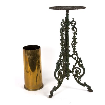 Lot 620 - A cast iron plant stand, the circular top on...