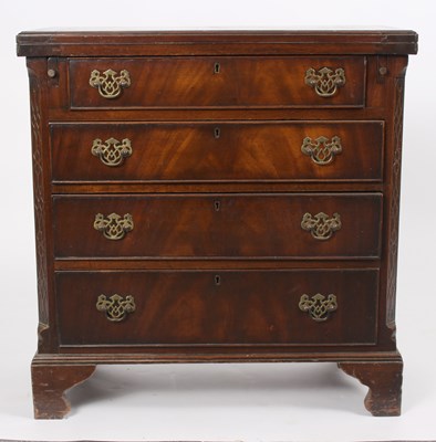 Lot 630 - A reproduction bachelor's chest, the fold-over...