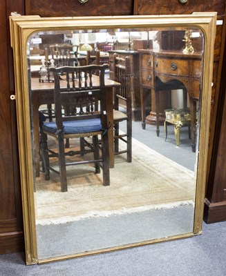 Lot 633 - A giltwood overmantel mirror with moulded...