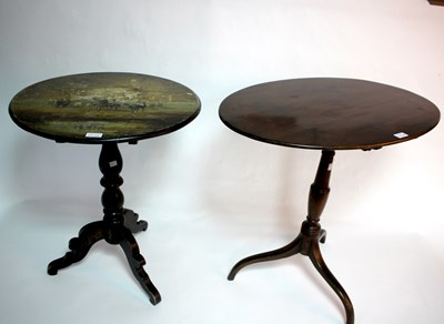 Lot 646 - A 19th Century tripod table, the circular top...