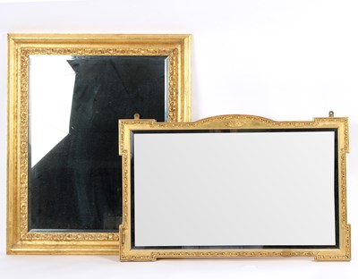 Lot 662 - A gilt framed wall mirror, the bevelled glass...