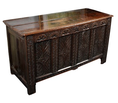 Lot 670 - A 17th Century oak chest, the hinged cover...