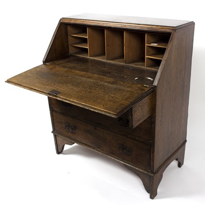 Lot 687 - An oak bureau fitted pigeonholes beneath the...