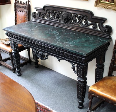 Lot 696 - A late Victorian ebonised console table with...