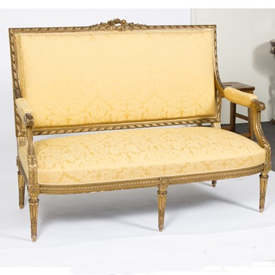 Lot 722 - A giltwood canape©, the top rail with carved...