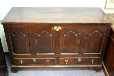 Lot 763 - An oak mule chest, the panelled front with two...