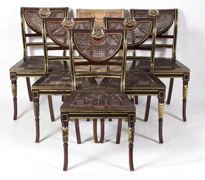 Lot 766 - Six Regency style parcel gilt chairs with cane...