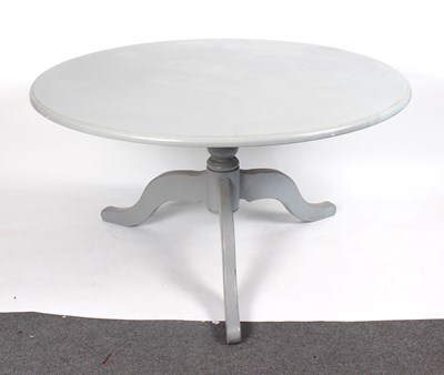 Lot 780 - A grey painted circular table on a turned...