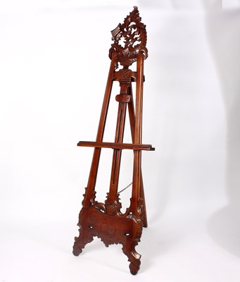 Lot 782 - A pierced and carved mahogany easel with...