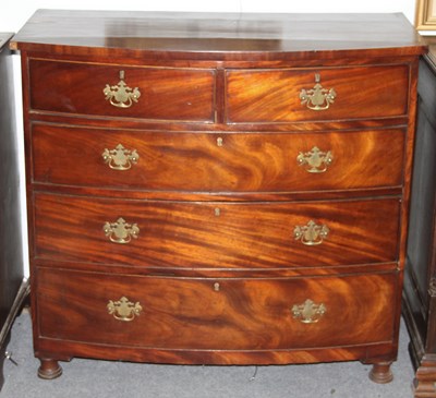 Lot 783 - An early 19th Century mahogany chest of three...