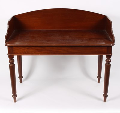 Lot 798 - A mahogany washstand with three-quarter...