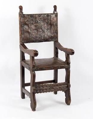 Lot 802 - A 17th Century Spanish armchair, the embossed...