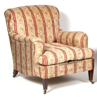 Lot 804 - A Howard armchair with original upholstery and...