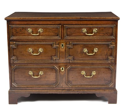 Lot 807 - A 17th Century oak chest of two short over two...