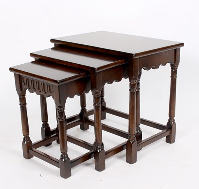 Lot 811 - A nest of three tables, the largest 50cm wide