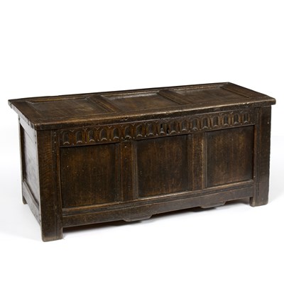 Lot 822 - An 18th Century oak coffer, with triple panel...