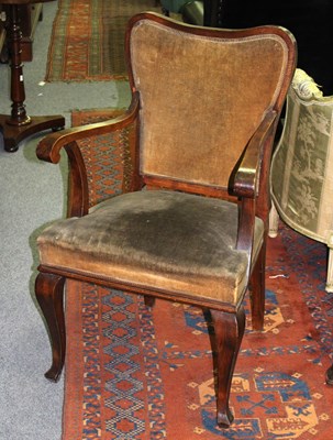 Lot 839 - An open armchair with upholstered back and seat