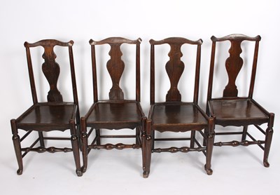 Lot 852 - A set of four ash and elm splat back chairs,...