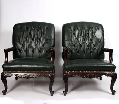 Lot 861 - A pair of 18th Century style library armchairs...