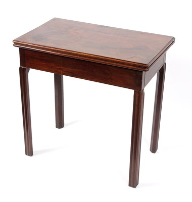 Lot 863 - A George III mahogany tea table on moulded...