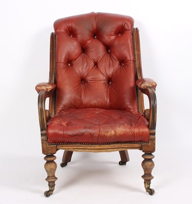 Lot 868 - A Victorian open armchair on turned legs and...