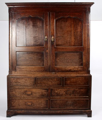 Lot 872 - An 19th Century oak cupboard with panelled...