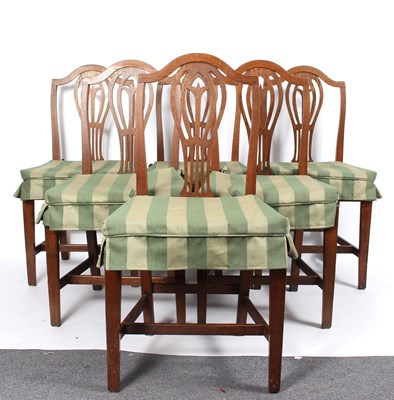 Lot 876 - A set of six oak dining chairs with arched...