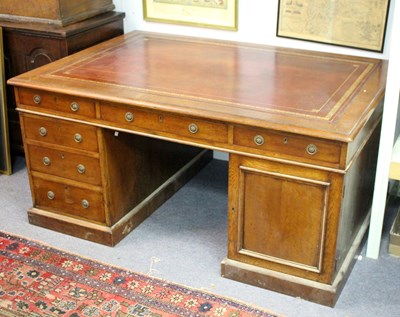 Lot 880 - A Victorian oak partners desk with burgundy...