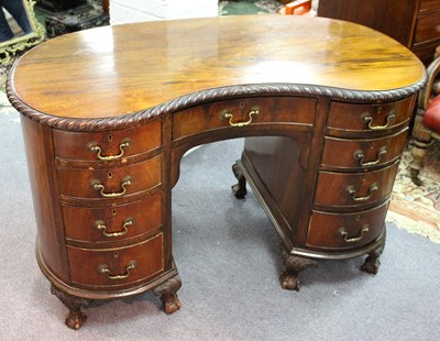 Lot 885 - A 1920s Chippendale revival mahogany...