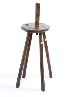 Lot 895 - An unusual oak stool, with pierced top and sconce