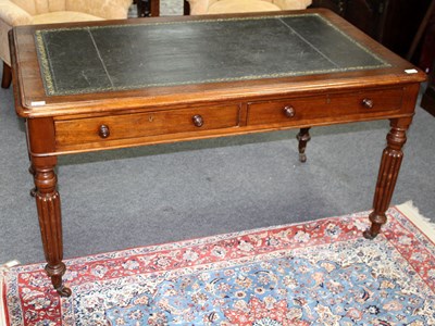 Lot 900 - An early 19th Century mahogany writing table,...